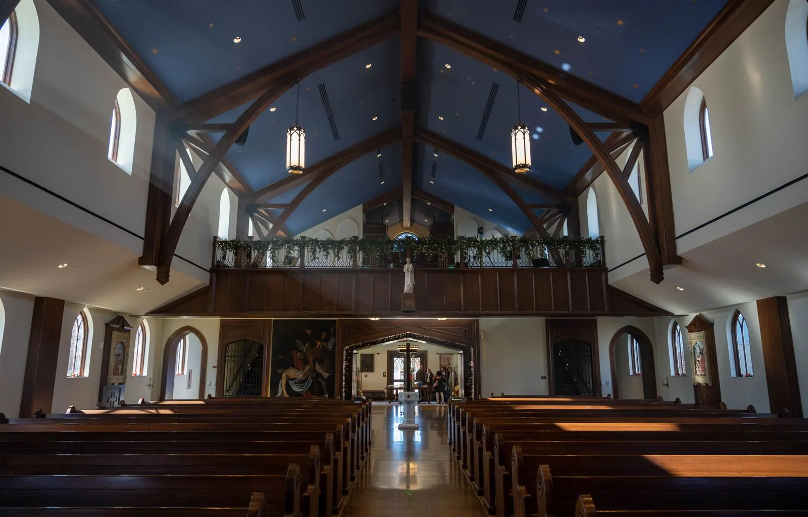 Spotless church sanctuary with polished pews and vacuumed aisle carpet Spotless church sanctuary with polished pews and vacuumed aisle carpet