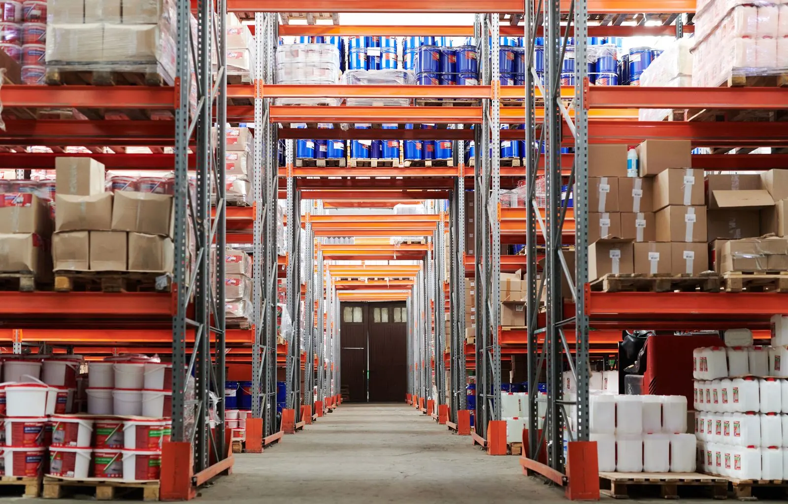 Clean industrial warehouse with sealed epoxy floor Clean industrial warehouse with sealed epoxy floor